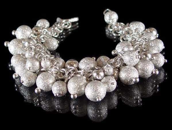 Ball and Chain bracelet in Sterling Silver by Liisa Gude Deberitz.