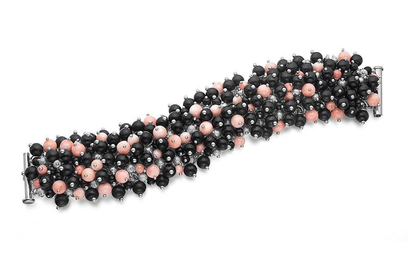 Caviar bracelet in Sterling silver, onyx and coral by Liisa Gude Deberitz.