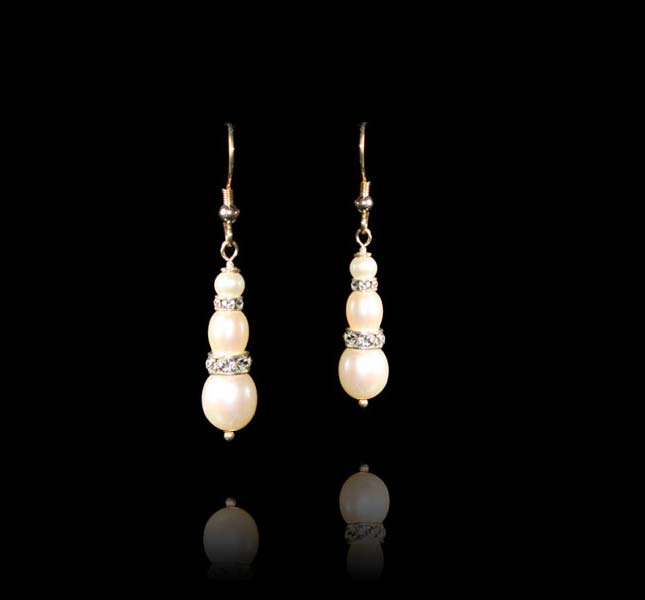 Pearl earrings by Liisa Gude Deberitz.