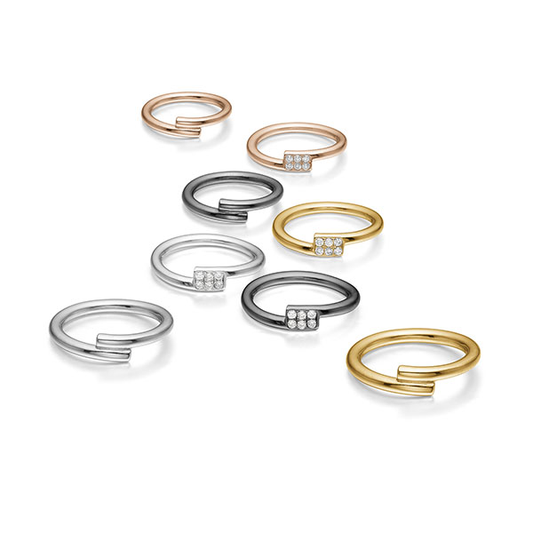 Side by Side gold rings with diamonds.